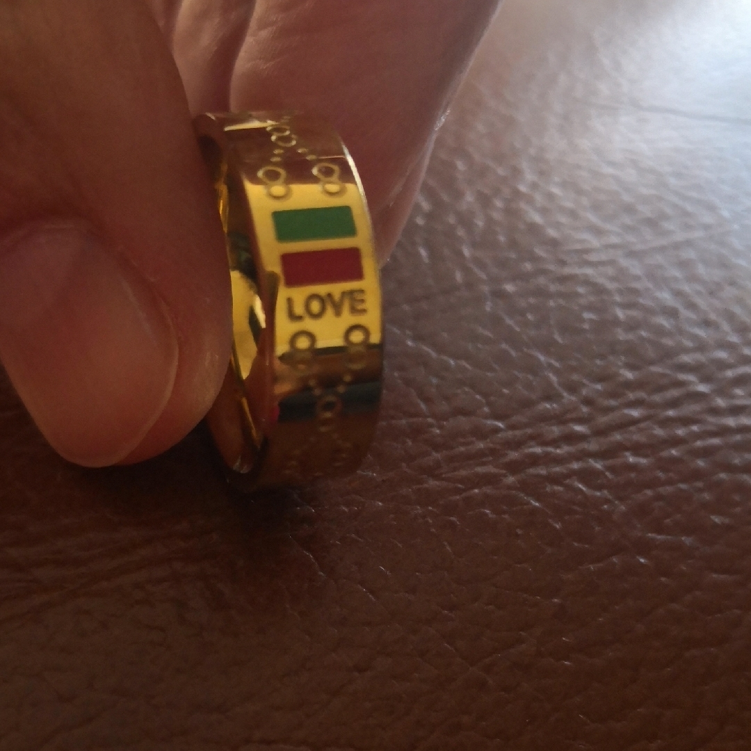 Gold Love Ring With Red And Green Accents